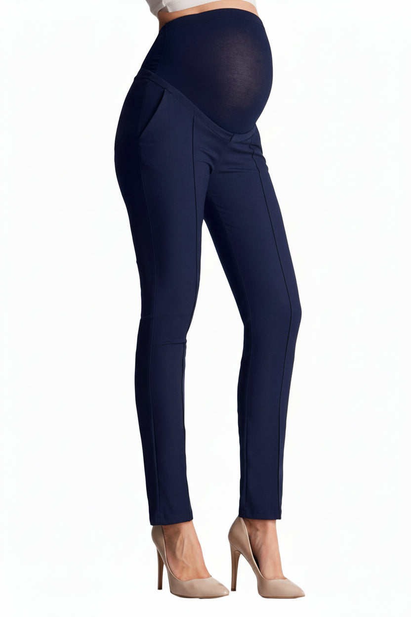 Navy blue maternity pants worn by a person on a white background