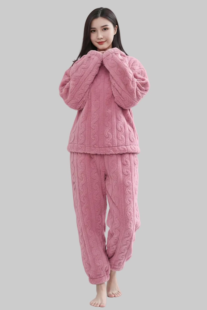 Person wearing a pink fluffy outfit on a plain background