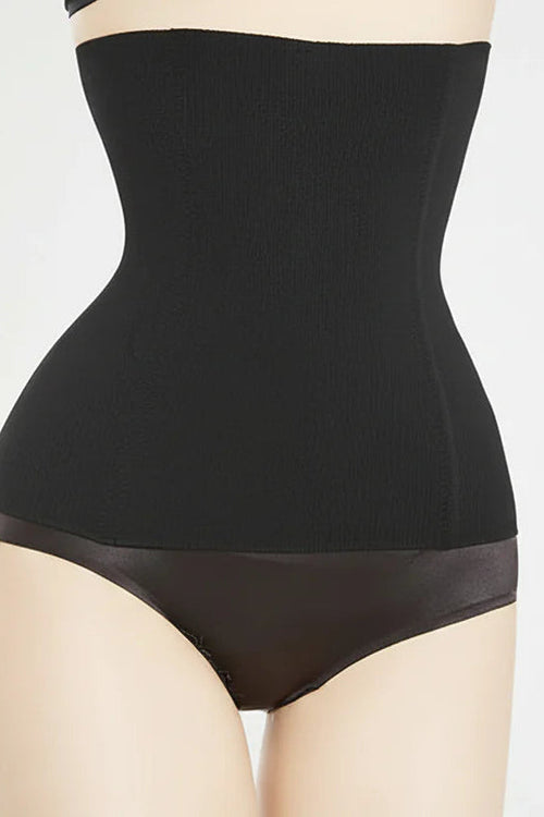 Black shapewear on a mannequin against a light gray background